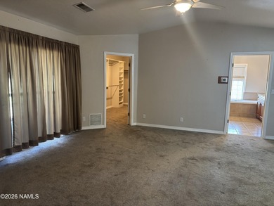 Fantastic golf course location home. Cedar siding and rock