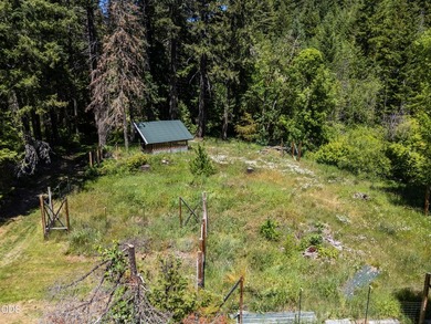 Remote, private, and surrounded by nature, this off-grid hunting - photo 41