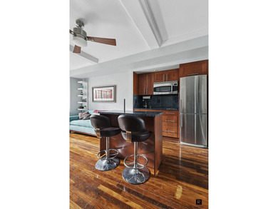This thoughtfully renovated one-bedroom home captures the best - photo 3