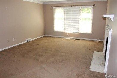 2-bedroom condo is nestled in a quiet neighborhood. The exterior - photo 12