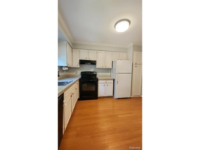 2-bedroom condo is nestled in a quiet neighborhood. The exterior - photo 13