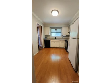2-bedroom condo is nestled in a quiet neighborhood. The exterior - photo 14