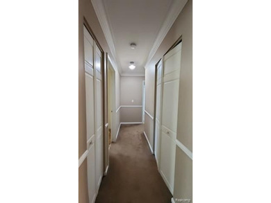 2-bedroom condo is nestled in a quiet neighborhood. The exterior - photo 15