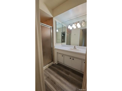 2-bedroom condo is nestled in a quiet neighborhood. The exterior - photo 18