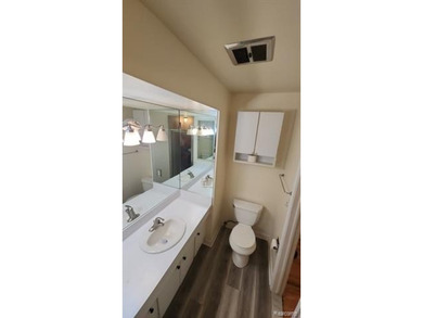 2-bedroom condo is nestled in a quiet neighborhood. The exterior - photo 19