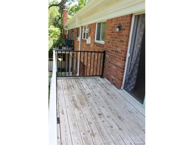 2-bedroom condo is nestled in a quiet neighborhood. The exterior - photo 21
