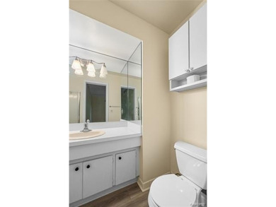 2-bedroom condo is nestled in a quiet neighborhood. The exterior - photo 24