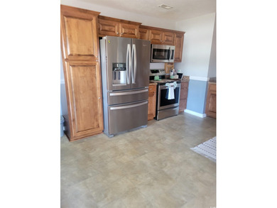 This well mantained home boasts with pride. It features an open