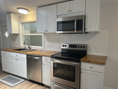 Listed by the Sales Team of Jamaica Bay Village. Beautiful - photo 9