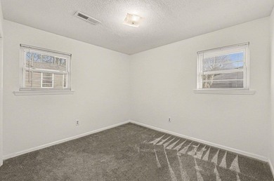 Set on a quiet street in the established Greenwood Park - photo 12