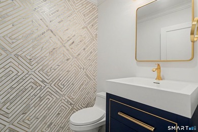 Fully remodeled with top-of-the-line finishes throughout, this - photo 18