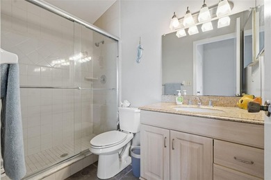 This bright and inviting 3rd-floor corner condo in coveted - photo 15