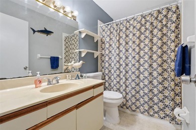 This bright and inviting 3rd-floor corner condo in coveted - photo 18
