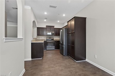 Enjoy easy one-level living in the sought-after Promenade at - photo 11