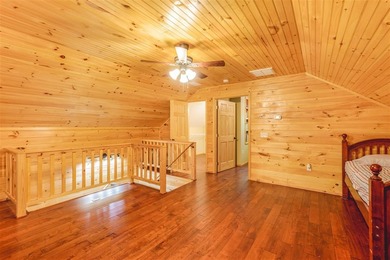 Lake living at its finest! This charming log-sided home offers - photo 14