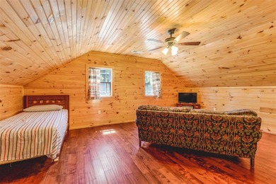 Lake living at its finest! This charming log-sided home offers - photo 16