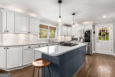 Nestled on a large 3/4+ acre serene, corner lot in the highly - photo 20