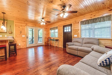 Lake living at its finest! This charming log-sided home offers - photo 23