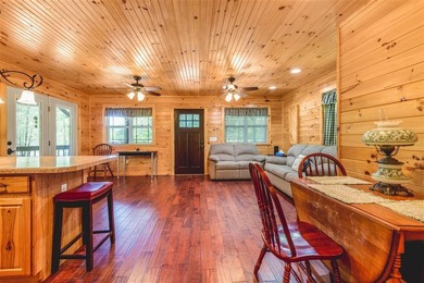 Lake living at its finest! This charming log-sided home offers - photo 24