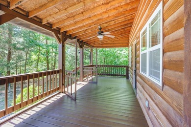 Lake living at its finest! This charming log-sided home offers - photo 34