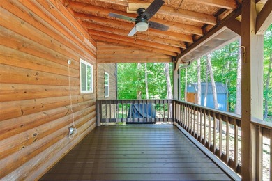 Lake living at its finest! This charming log-sided home offers - photo 35