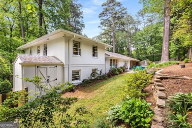 Nestled on a large 3/4+ acre serene, corner lot in the highly - photo 46