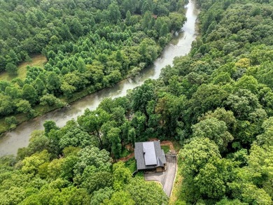 **$130K IN STR PROJECTIONS!** Overlooking the rushing bend of - photo 2