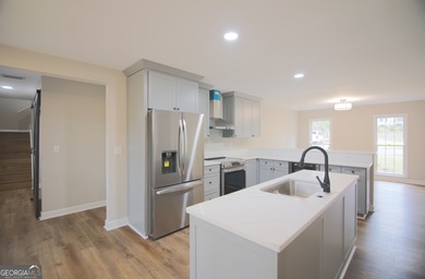 Renovations are complete! This huge home comes complete with a