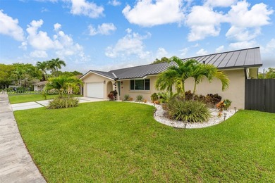 Nestled on a quiet street in one of East Kendall's most - photo 1
