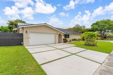 Nestled on a quiet street in one of East Kendall's most - photo 2
