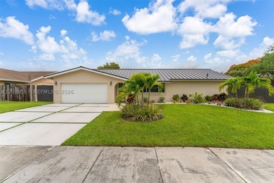 Nestled on a quiet street in one of East Kendall's most - photo 3