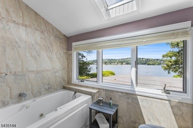 Lake Mohawk lakefront, picturesque 4-bedroom, 3-bathroom home - photo 32