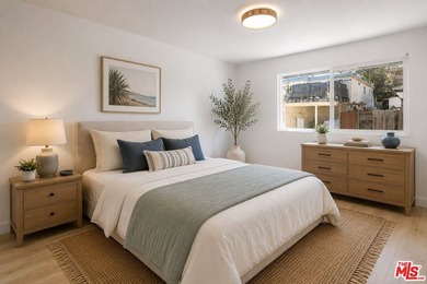 Welcome to this bright and inviting 2-bedroom, 1-bath end-unit - photo 11