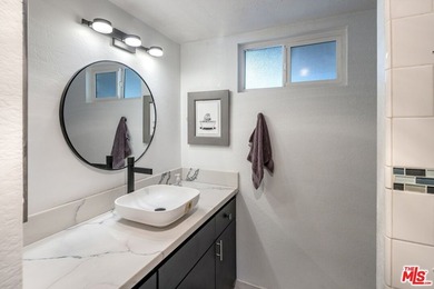 Welcome to this bright and inviting 2-bedroom, 1-bath end-unit - photo 12
