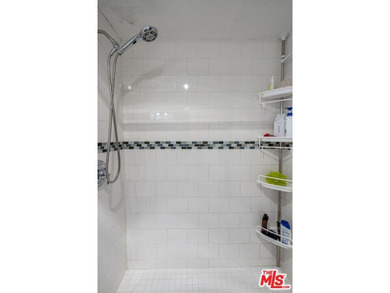 Welcome to this bright and inviting 2-bedroom, 1-bath end-unit - photo 13