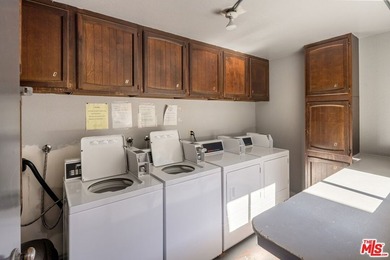 Welcome to this bright and inviting 2-bedroom, 1-bath end-unit - photo 15
