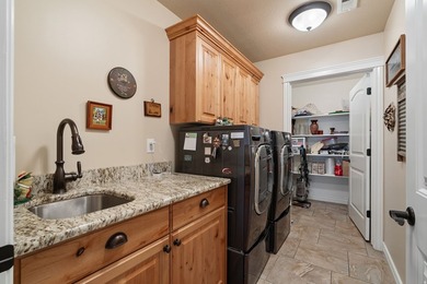 Located in East Layton, this highly sought-after patio home - photo 20