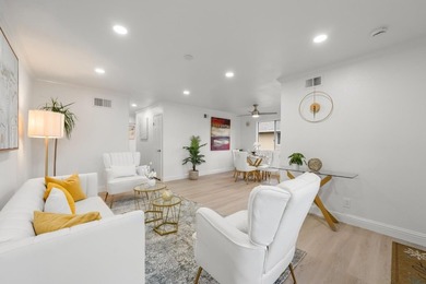 This stunning upstairs townhouse-style condo offers the perfect - photo 2