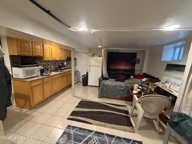 Opportunity to own legal 2 family with full finished basement - photo 15