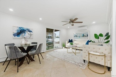 This well-appointed waterfront home blends timeless elegance - photo 18