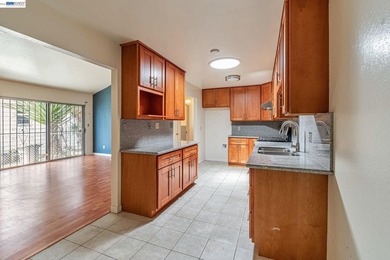 This well-maintained duet-style home, built in 1985, offers 3 - photo 8