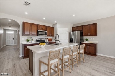 ASSUMABLE FHA LOAN 4.25% Interest Rate!! This well-maintained - photo 3