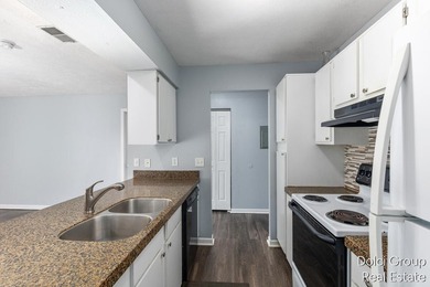 Discover this desirable Allendale end-unit condo offering extra - photo 4