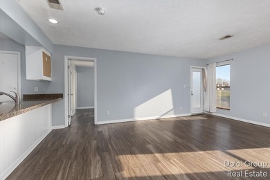 Discover this desirable Allendale end-unit condo offering extra - photo 8