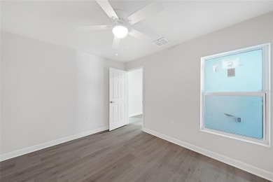 This nearly completed WATERFRONT TRIPLEX in Rotonda West, FL, is