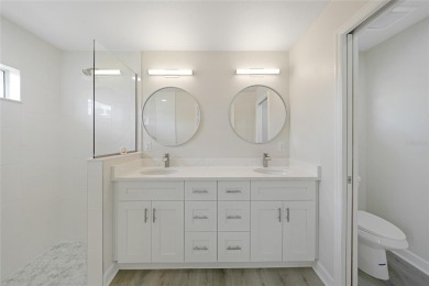 This nearly completed WATERFRONT TRIPLEX in Rotonda West, FL, is