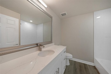 This nearly completed WATERFRONT TRIPLEX in Rotonda West, FL, is