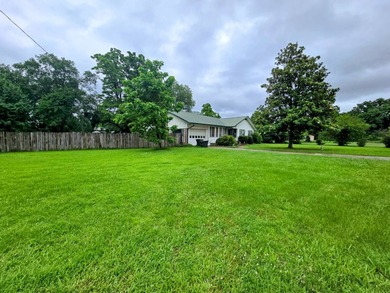 Welcome to this inviting 3-bedroom, 2-bath home located in a - photo 3