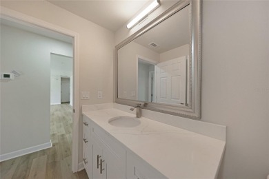 This nearly completed WATERFRONT TRIPLEX in Rotonda West, FL, is