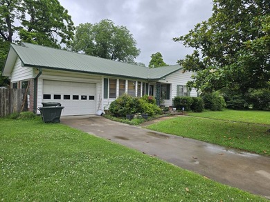 Welcome to this inviting 3-bedroom, 2-bath home located in a - photo 4